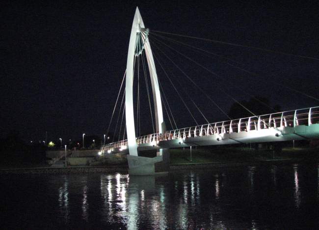 Pedestrian suspension bridge at night