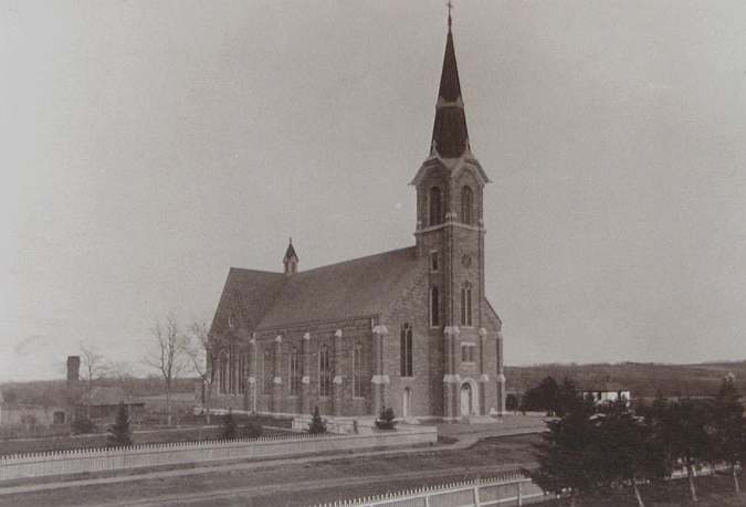 1905 photo of St. Mary's Catholic Church on display at the church enterance