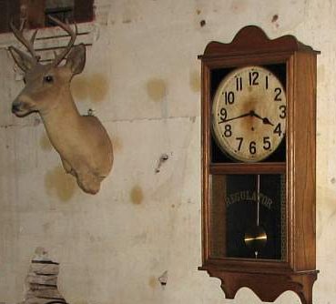 Bullet holes in the Ellinwood underground barbershop wall