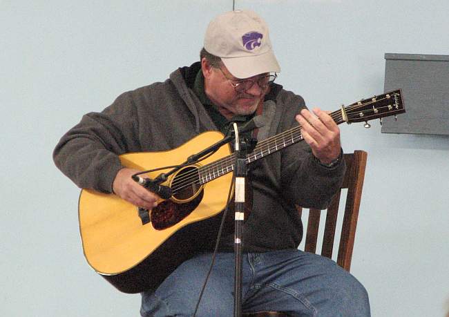 Roy Curry on stage at Winfield's Walnut Valey Festival