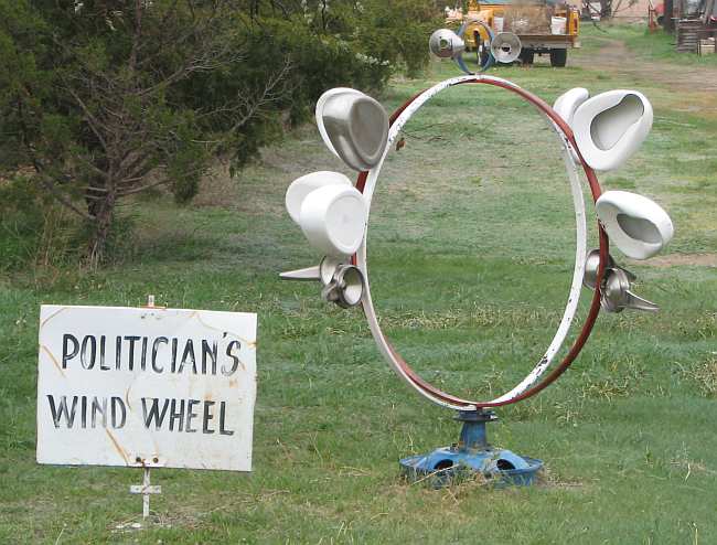 Politician's Wind Wheel metal sculpture