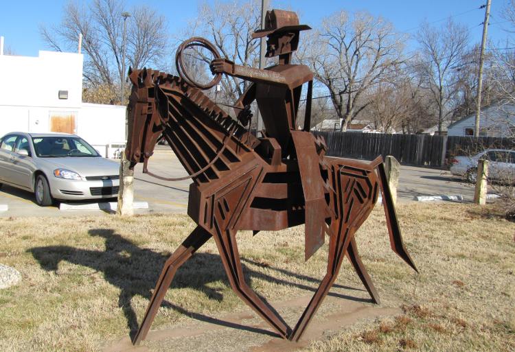 Frank Jensen sculpture of cowboy on horseback