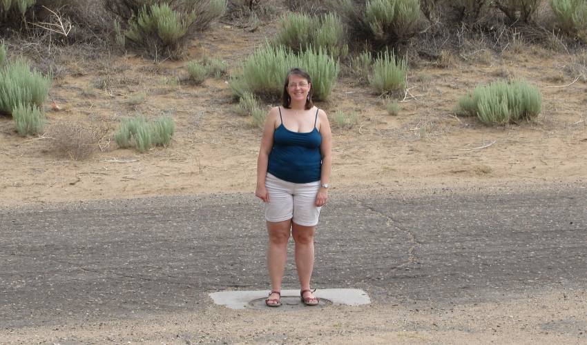 standing on the Tristate Marker
