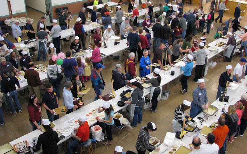 Feeding the Multitudes serving tables - Kansas Mennonite Relief Sale