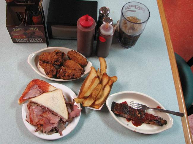 BBQ sandwich and hot wings at Quick's Bar-B-Q in Kanas City, Kanasas