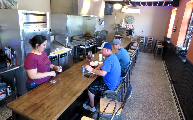 The counter and grill at the Snackle Box Restaurant