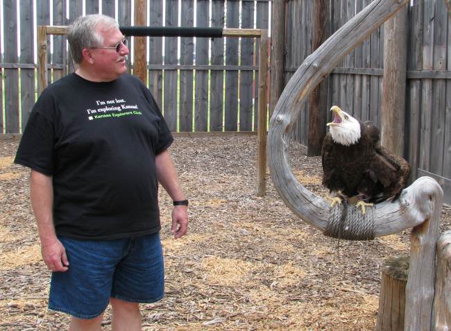 Keith Stokes with a bald eagle at the Eagle Valley Raptor Center