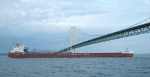 Mackinac Bridge and freighter