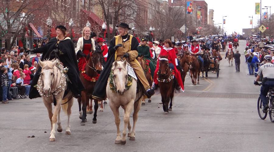 Victorian Ladies Club in the horse drawn Lawrence Christmas Parade