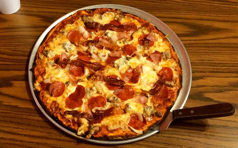 meat pizza at the Pizza Man in Lenexa, Kansas