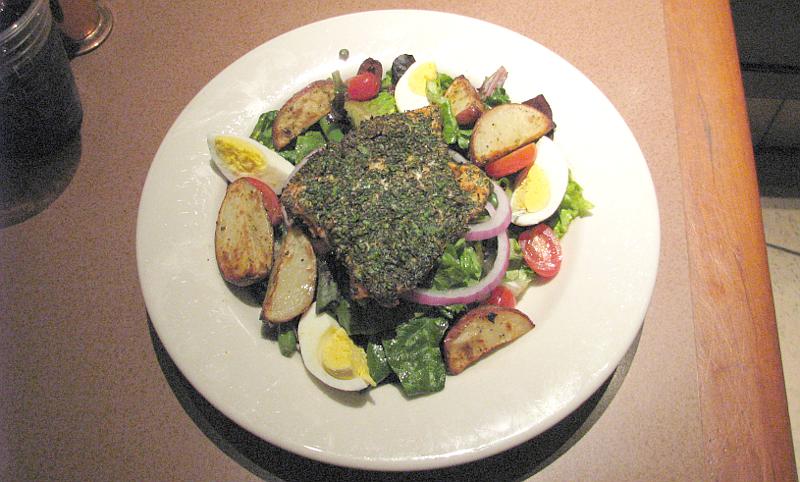 crusted salmon served with the Nicoise salad