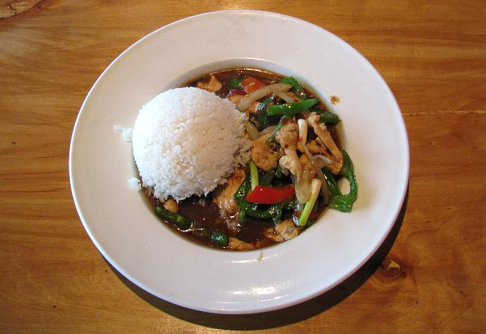 Thai spicy stir fried chicken with steamed rice