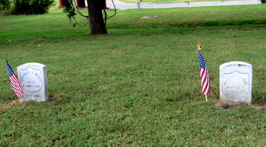 Charles E. Scott and Augustus Urban military grave markers